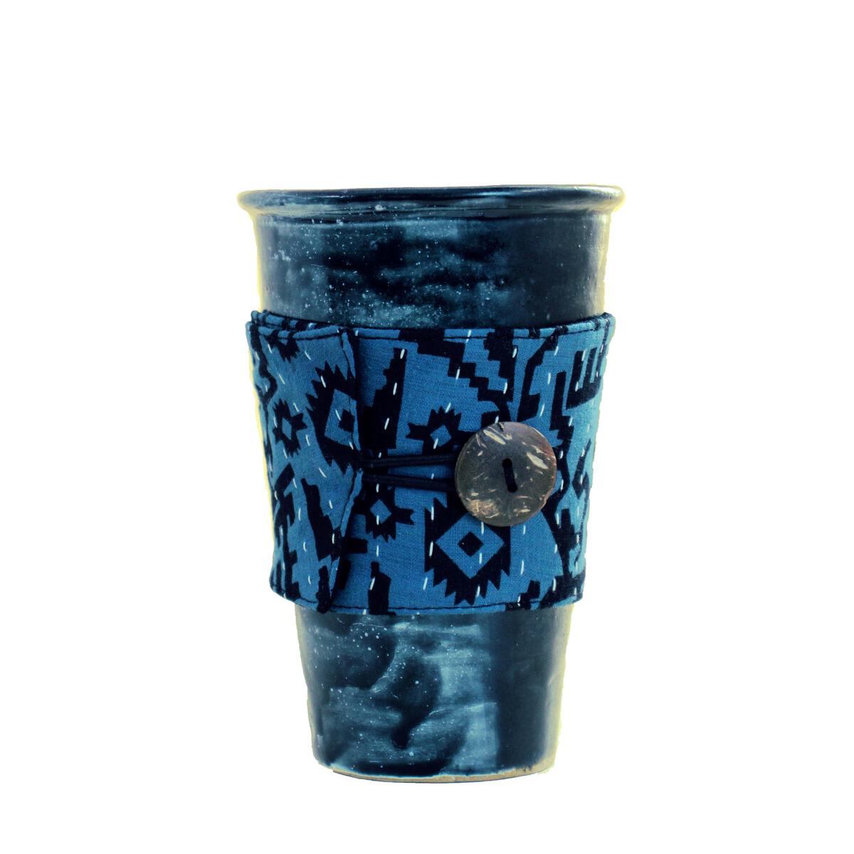 https://www.bashaboutique.com/wp-content/uploads/2023/01/Kantha-Reusable-Coffee-Cup-Sleeve-2.jpg